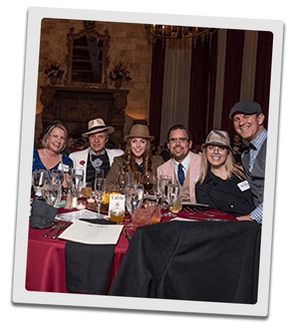 Philadelphia Murder Mystery party guests at the table